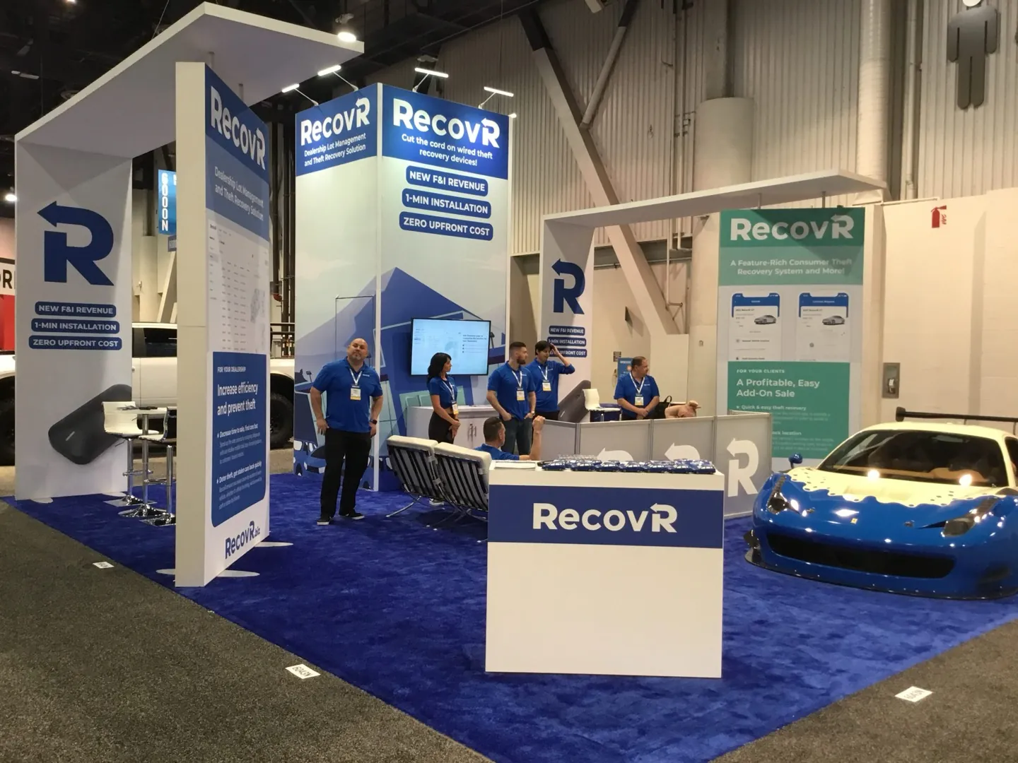 RecovR exhibit with illuminated blue architecture on the show floor