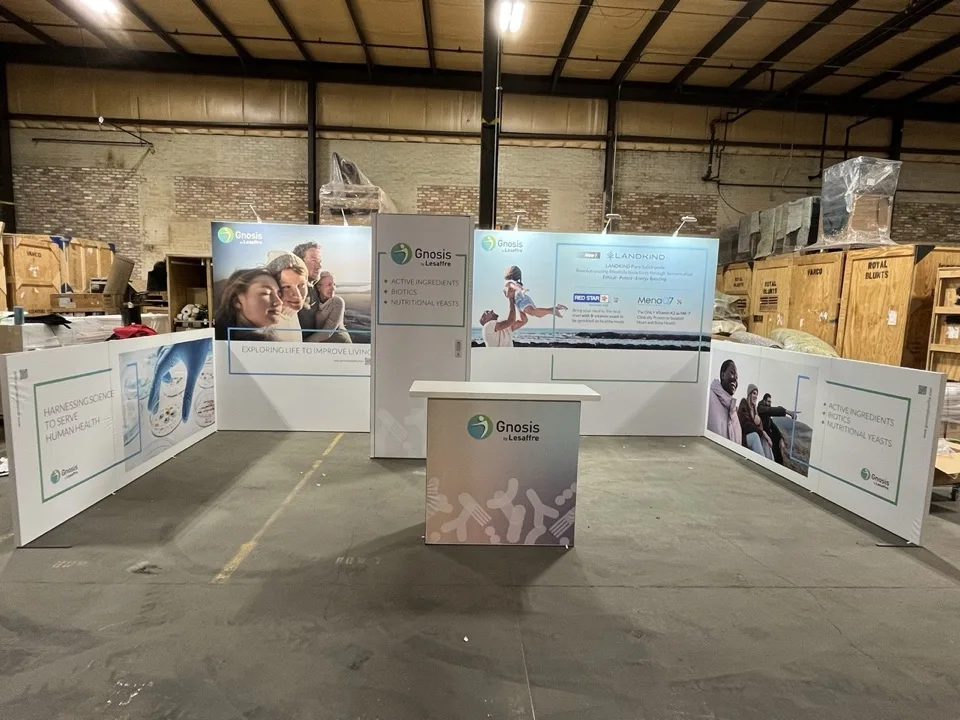 Light blue exhibit walls arranged on the fabrication floor