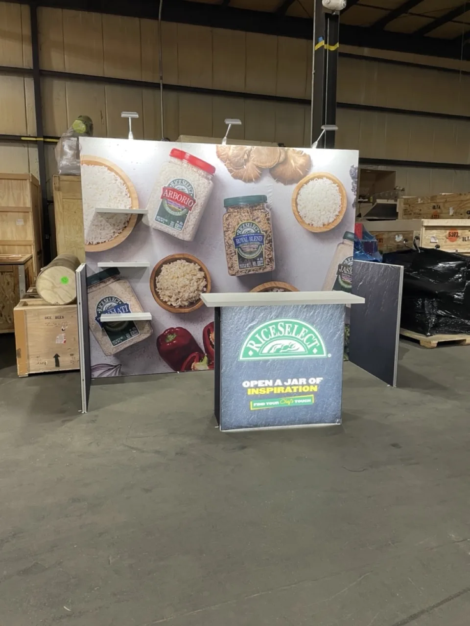 Compact branded display photographed on the fabrication floor